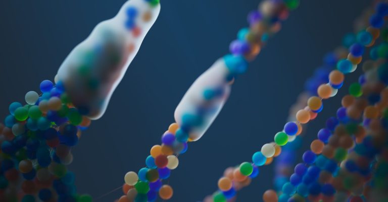 Close-up of a colorful abstract representation of DNA strands, illustrating science and genetics.