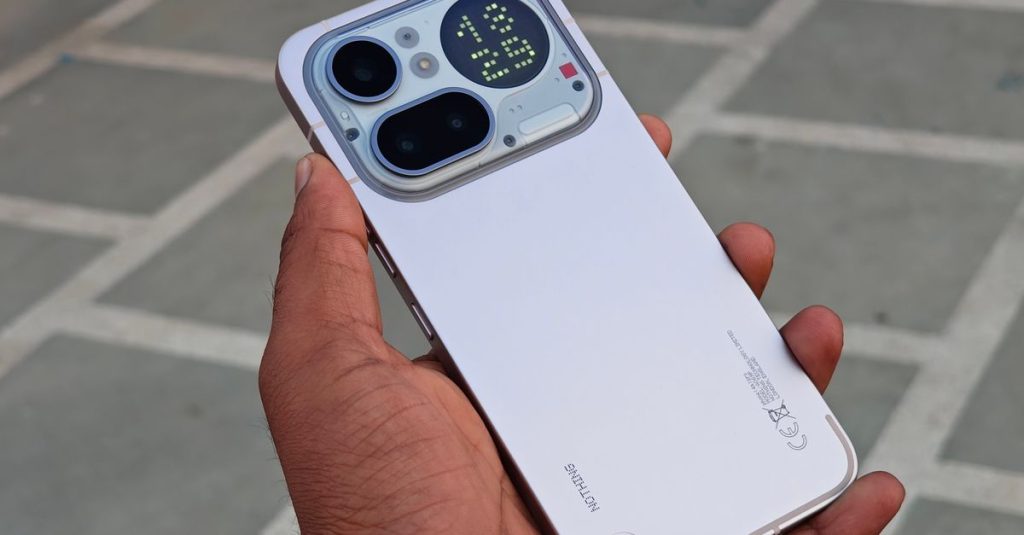 Close-up of a modern smartphone showcasing rear display and camera features.