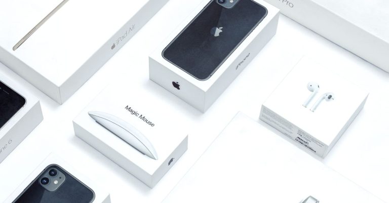 Flat lay of assorted Apple product boxes showcasing technology packaging design.