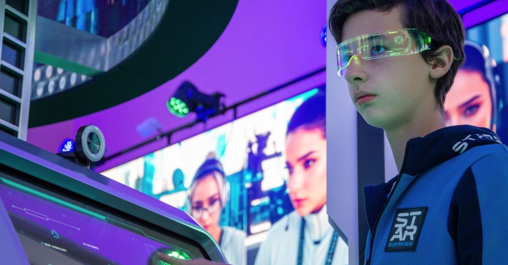 Teenager interacts with advanced touchscreen in a vibrant technology exhibition.