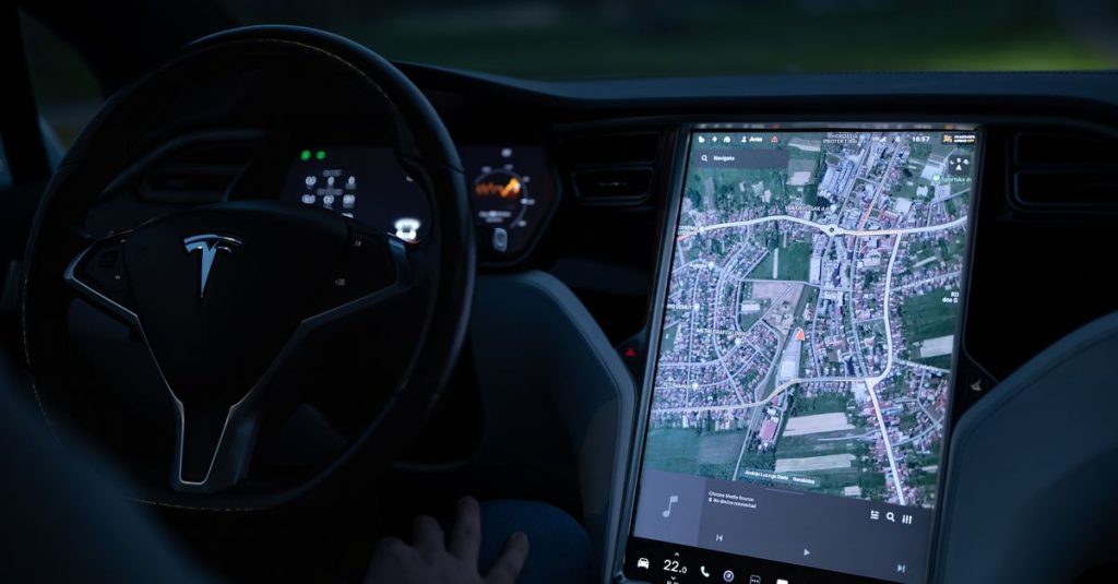Explore the advanced touchscreen navigation in a modern electric vehicle's sleek interior at night.